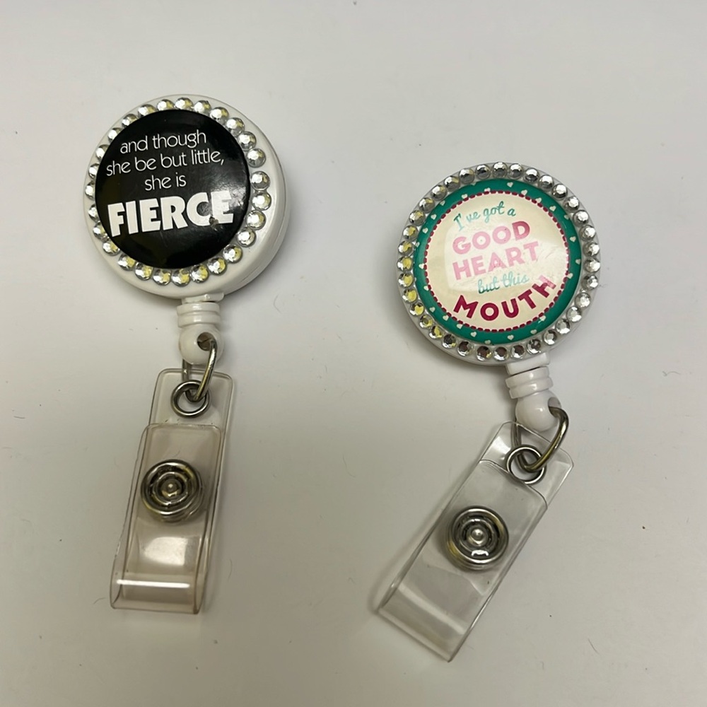 2 New never been used badge reels